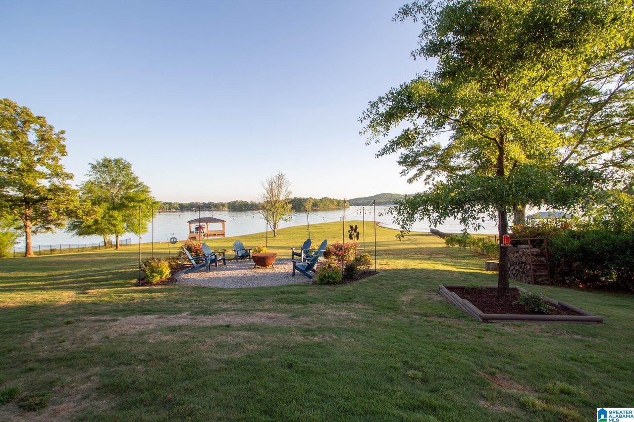 Waterfront lawn and dock at Skyline on Logan Martin